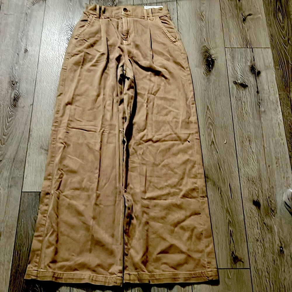 American Eagle jeans that are a size 0, super high rise wide leg with stretch.